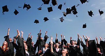 schools run drug testing programs using hair and this picture is of graduates throwing their mortar boards into a blue sky